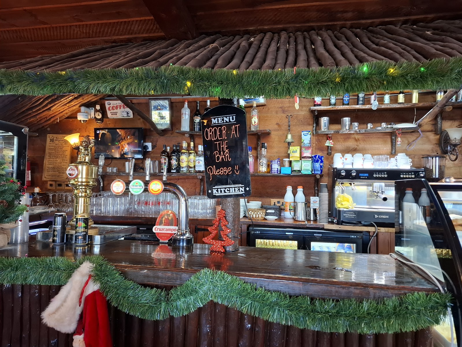 Bar with beer taps, coffee machine and chalkboard menus