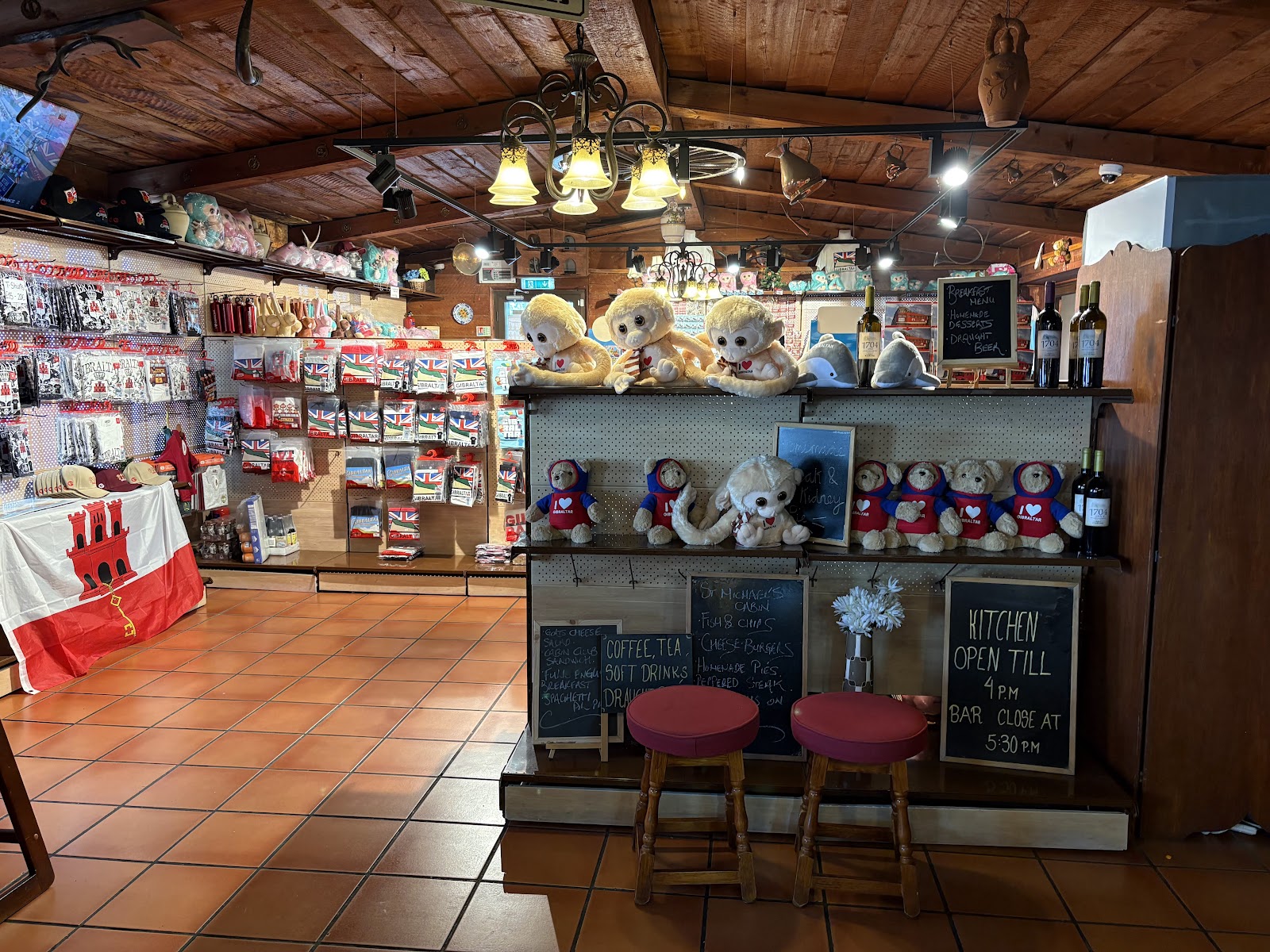 Souvenir shop shelves and chalkboard menus